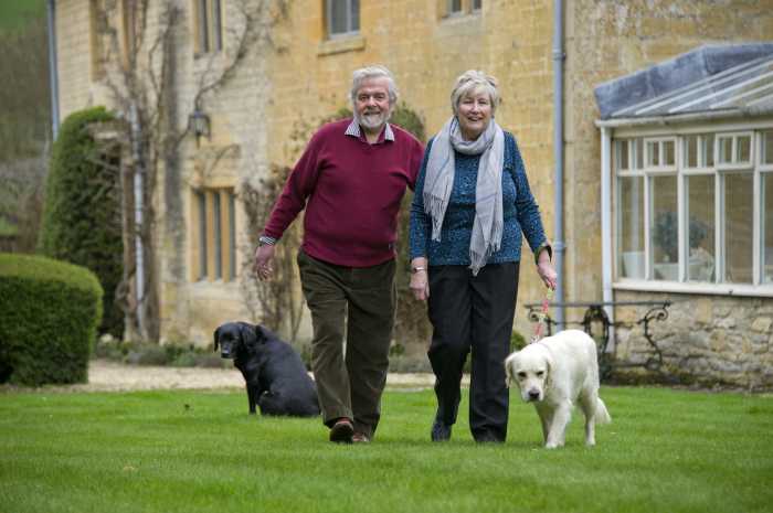 Homesitters Clive & Yolande Noble walking dogs
